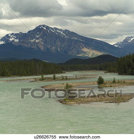 Stock Photography - Reflection in Moose Lake, Mt. Robson Provincial Park, Canada. Fotosearch