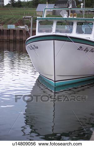 A boat docked at Prince Edward Island, Canada View Large Photo Image Stock Photograph - A boat docked at Prince Edward Island, Canada. Fotosearch