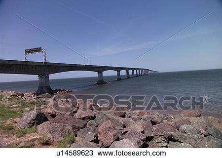 Bridge spanning over the sea in Prince Edward Island, Canada View Large Photo Image Stock Image - Bridge spanning over the sea in Prince Edward Island, Canada. Fotosearch