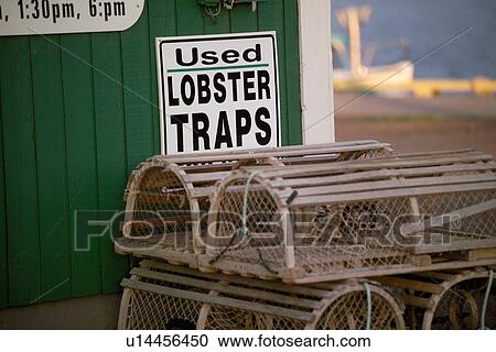 Lobster traps stacked outside an establishment in Prince Edward Island, Canada View Large Photo Image Stock Image - Lobster traps stacked outside an establishment in Prince Edward Island, Canada. Fotosearch