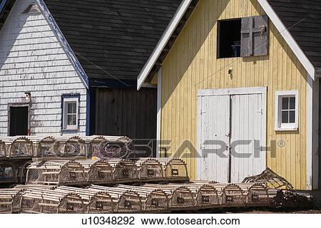 Lobster Traps Stacked Up Outside An Establishment In Prince Edward