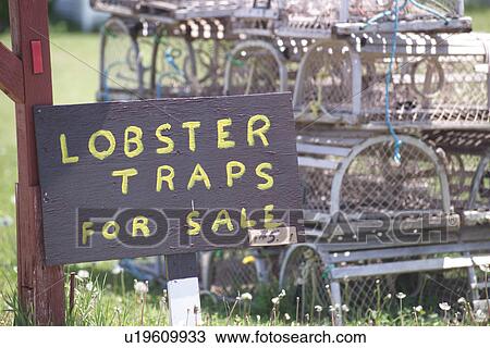 Stock Image - Sign board proclaiming sale of lobster traps in Prince Edward Island, Canada. Fotosearch