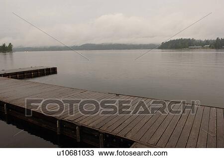 Stock Image - Dock on Shawnigan Lake, Vancouver Island, Canada. Fotosearch