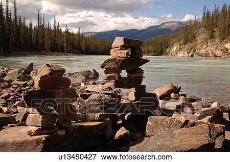 Stock Photo - Formation of Rock on shoreline of Medicine Lake, Jasper National Park, Canada. Fotosearch