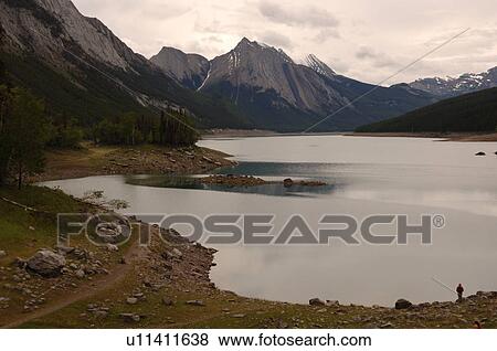 Stock Photo - Overview of Medicine Lake, Jasper National Park, Canada. Fotosearch