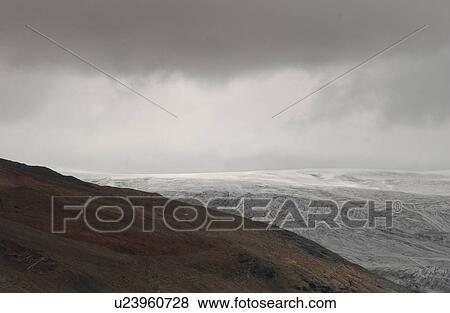 Stock Photo - Panoramic view of the horizon on a mountain, Rocky Mountains, Canada. Fotosearch