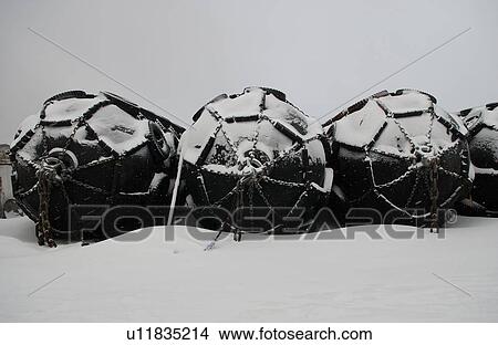 Picture - Churchill Northern Manitoba town and surroundings Buoy on Frozen Water. Fotosearch