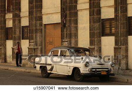 A car parked in front of a building, Havana, Cuba View Large Photo Image Stock Image - A car parked in front of a building, Havana, Cuba. Fotosearch