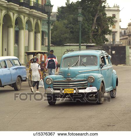 An antique car on the street, Havana, Cuba View Large Photo Image Stock Photo - An antique car on the street, Havana, Cuba. Fotosearch