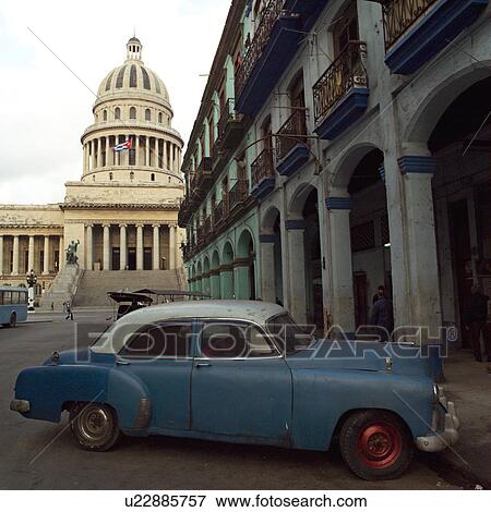 Antique car parked near the capitol building, Havana, Cuba View Large Photo Image Stock Photo - Antique car parked near the capitol building, Havana, Cuba. Fotosearch