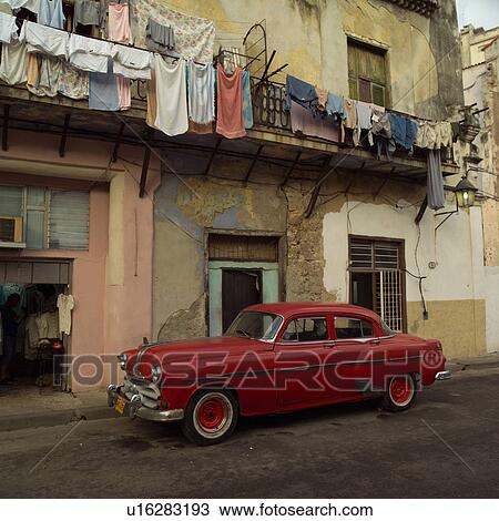 Antique car parked outside a building, Havana, Cuba View Large Photo Image Stock Image - Antique car parked outside a building, Havana, Cuba. Fotosearch