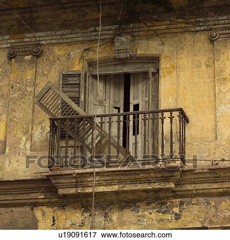 Broken shutter in a balcony, Havana, Cuba View Large Photo Image Stock Photo - Broken shutter in a balcony, Havana, Cuba. Fotosearch