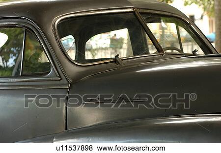 Close-up of the side of a vintage car, Havana, Cuba View Large Photo Image Stock Photo - Close-up of the side of a vintage car, Havana, Cuba. Fotosearch