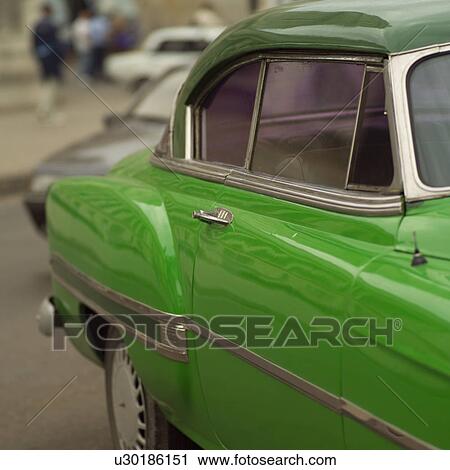 Stock Image - Side of an antique car, Havana, Cuba. Fotosearch