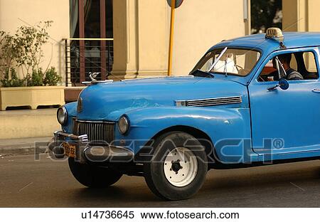 Side profile of a taxicab, Havana, Cuba View Large Photo Image Stock Photography - Side profile of a taxicab, Havana, Cuba. Fotosearch