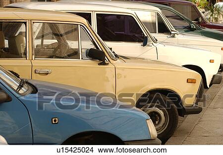 Side profile of cars in a parking lot, Havana, Cuba View Large Photo Image Picture - Side profile of cars in a parking lot, Havana, Cuba. Fotosearch