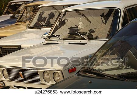 Side profile of cars in a parking lot, Havana, Cuba View Large Photo Image Stock Image - Side profile of cars in a parking lot, Havana, Cuba. Fotosearch