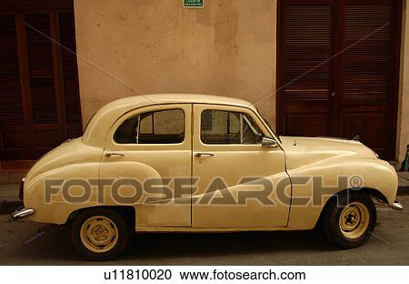 Stock Image - Side view of a car, Havana, Cuba. Fotosearch