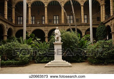 Stock Image - A statue in front of a building, Havana, Cuba. Fotosearch