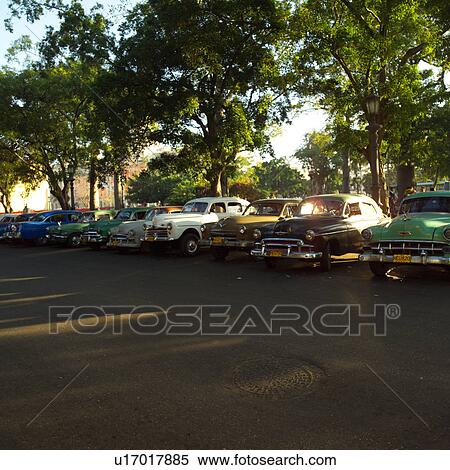 An array of parked antique taxi cabs, Havana, Cuba View Large Photo Image Stock Photography - An array of parked antique taxi cabs, Havana, Cuba. Fotosearch