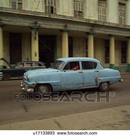 Stock Image - Antique car on the streets, Havana, Cuba. Fotosearch