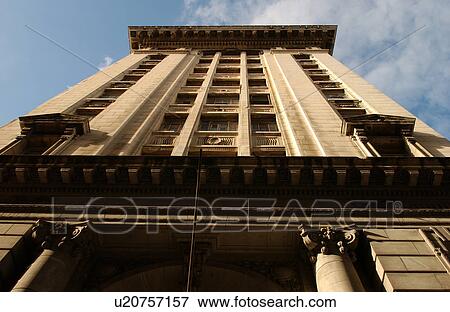 Stock Photo - Low angle view of a skyscraper in an urban city, Havana, Cuba. Fotosearch