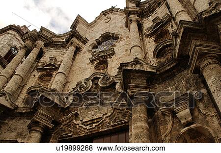 Low angle view of the facade of an ornate building, Havana, Cuba View Large Photo Image Stock Photo - Low angle view of the facade of an ornate building, Havana, Cuba. Fotosearch