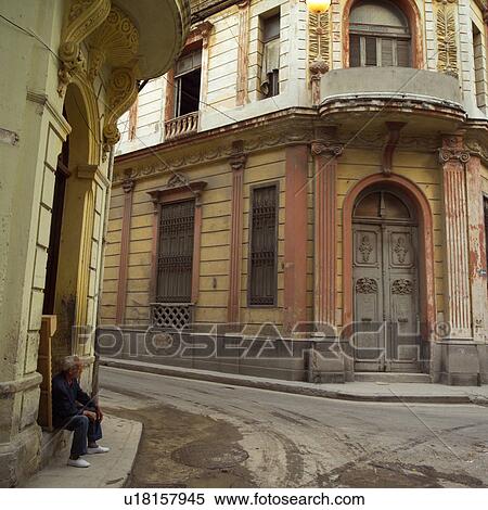 Old man sitting in a doorway, Havana, Cuba View Large Photo Image Stock Photography - Old man sitting in a doorway, Havana, Cuba. Fotosearch