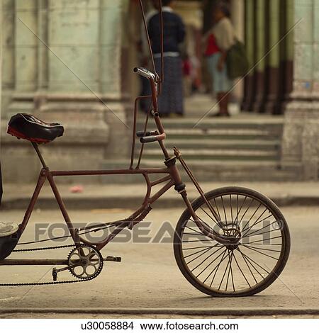 Pedicab on the street, Havana, Cuba View Large Photo Image Picture - Pedicab on the street, Havana, Cuba. Fotosearch