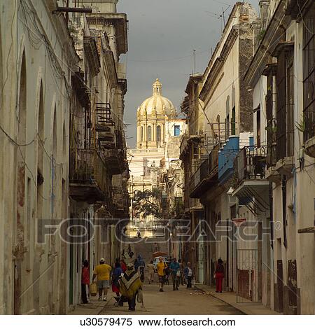 Stock Photography - People in an alleyway, Havana, Cuba. Fotosearch
