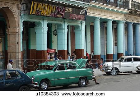 Side profile of antique cars parked outside a building, Havana, Cuba View Large Photo Image Stock Image - Side profile of antique cars parked outside a building, Havana, Cuba. Fotosearch