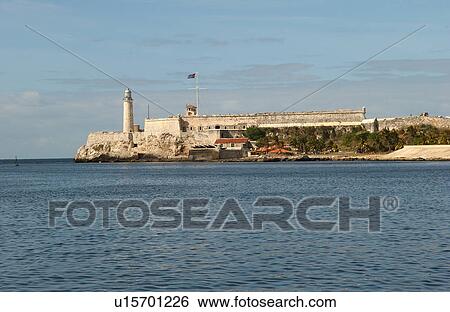 Stock Photograph - View of a fort on the seafront, Havana, Cuba. Fotosearch