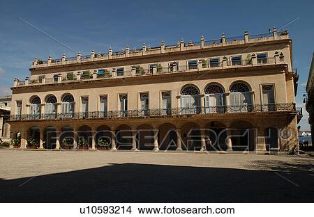 Picture - Facade of a building with arches in the front, Havana, Cuba. Fotosearch