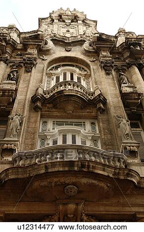 Low angle view of the facade of an ornate building, Havana, Cuba View Large Photo Image Stock Photo - Low angle view of the facade of an ornate building, Havana, Cuba. Fotosearch
