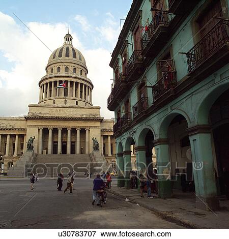 People on the street in front of the capitol building, Havana, Cuba View Large Photo Image Stock Photo - People on the street in front of the capitol building, Havana, Cuba. Fotosearch