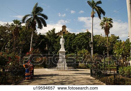 Stock Photo - View of a statue mounted in a public park, Havana, Cuba. Fotosearch