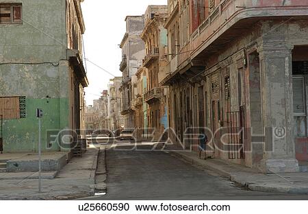 Stock Image - View of an alley between buildings, Havana, Cuba. Fotosearch