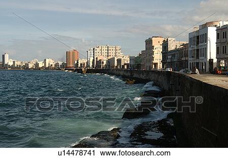 View of waves crashing on the seafront on an urban city, Havana, Cuba View Large Photo Image Stock Image - View of waves crashing on the seafront on an urban city, Havana, Cuba. Fotosearch
