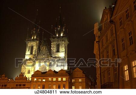 Stock Image - Historical building lit up at night in Prague. Fotosearch