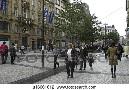 People walking on the sidewalk in Prague View Large Photo Image Stock Image - People walking on the sidewalk in Prague. Fotosearch