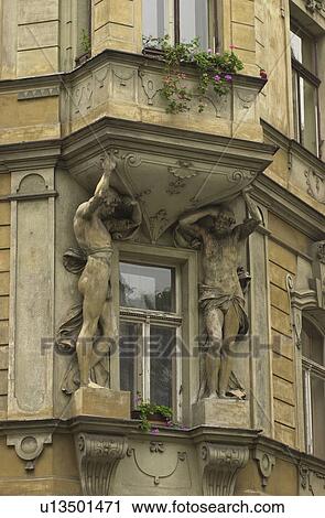 Stock Image - Stoner sculptures on an ancient building in Prague. Fotosearch