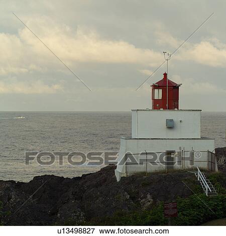 Stock Photo - Lighthouse on Broken Islands, Pacific Rim Park, Vancouver Island, Canada. Fotosearch