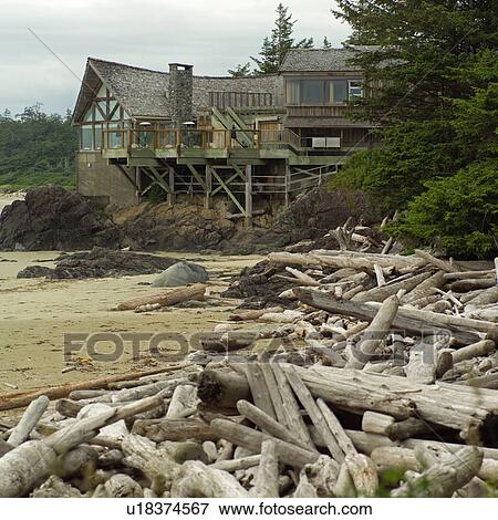 Stock Photo - Lodge on shoreline, Wickaninnish Beach Trail, Vancouver Island, Canada. Fotosearch