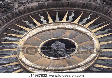Stock Image - Close-up of an ancient clock on a building in Paris, France. Fotosearch