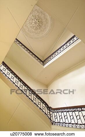 Stock Photo - Interior view of a stairwell of a building in Paris, France. Fotosearch