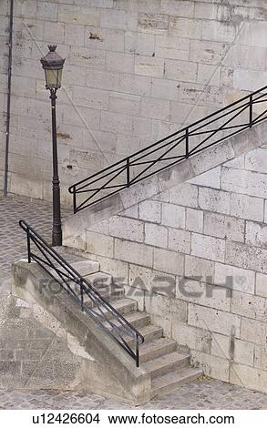 Picture - Stairs with a railing in Paris, France. Fotosearch