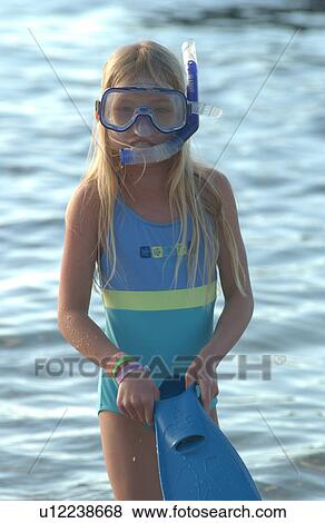 Stock Photo - Kids playing on beach - Hawaii. Fotosearch