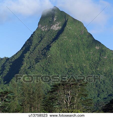 Stock Image - Mountain Peak at Moorea in Tahiti. Fotosearch