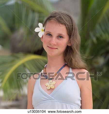 Portrait of Brunette with Flower in Her Hair View Large Photo Image Picture - Portrait of Brunette with Flower in Her Hair. Fotosearch