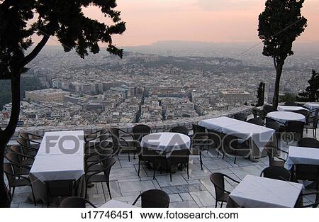 A restaurant overlooking the city of Athens, Greece View Large Photo Image Stock Image - A restaurant overlooking the city of Athens, Greece. Fotosearch